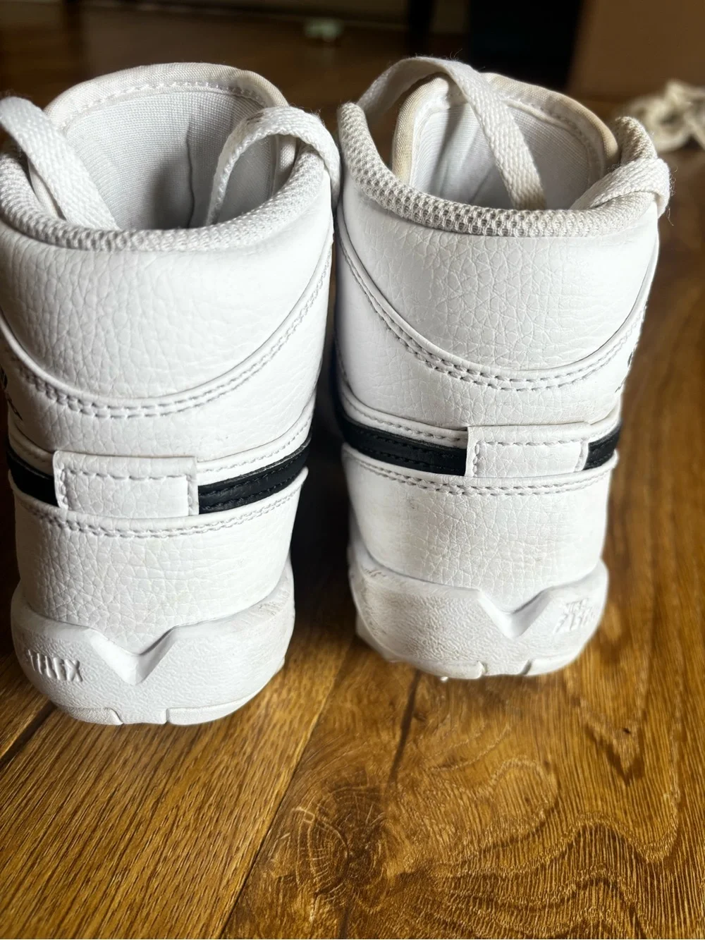 Nike White High-Top Jordan Sneakers with Black Jumpman